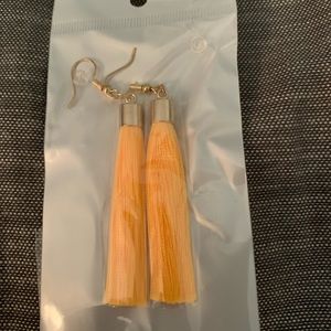 Yellow tassel with gold accent